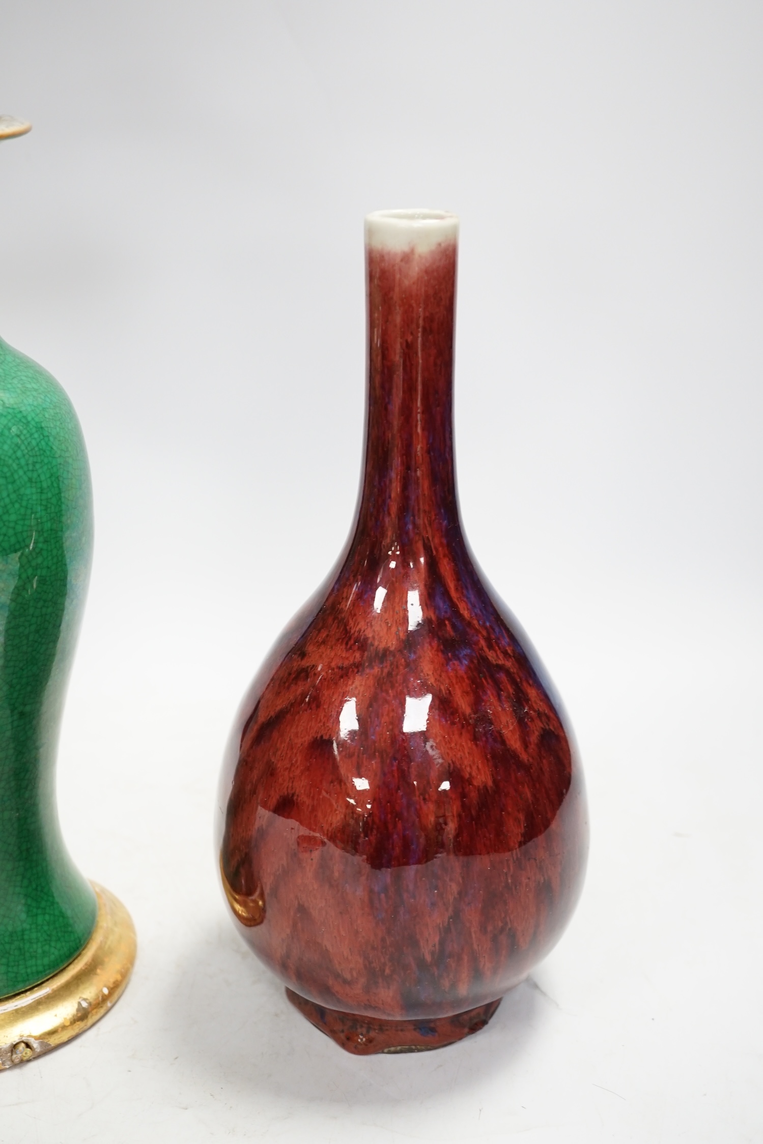 A Chinese green crackle glazed vase converted to a lamp base and a flambé style vase, lamp base 50cm high including light fitting. Condition - fair, losses to the gilt base of lamp base